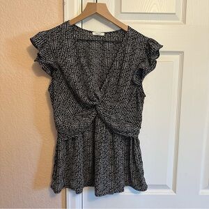 Black and white flutter sleeve sweetheart neckline blouse